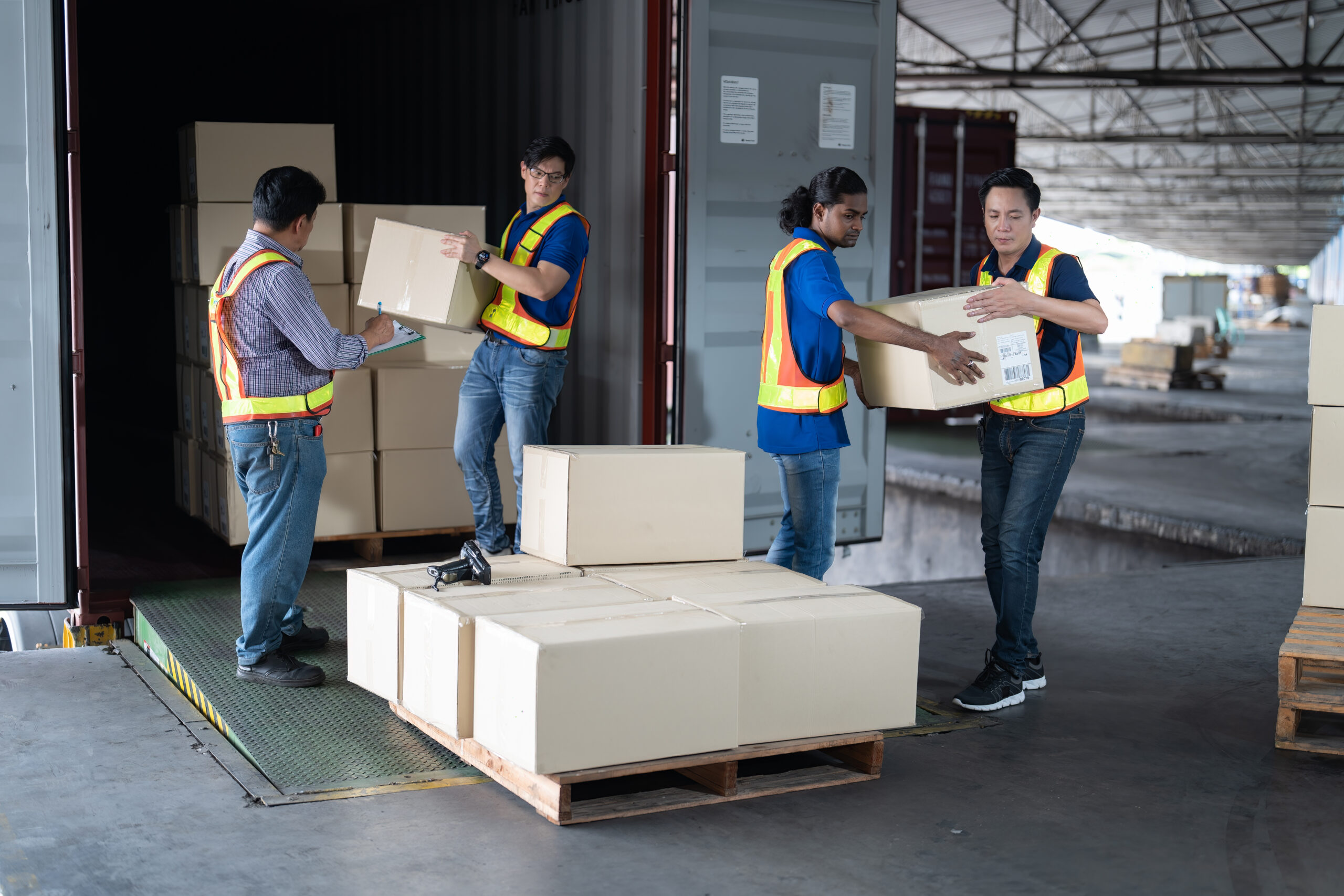 Workers open steel 40 feet container doors carry box supervisor standing check paper checklist